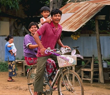 Pah Leurat family on bicycle